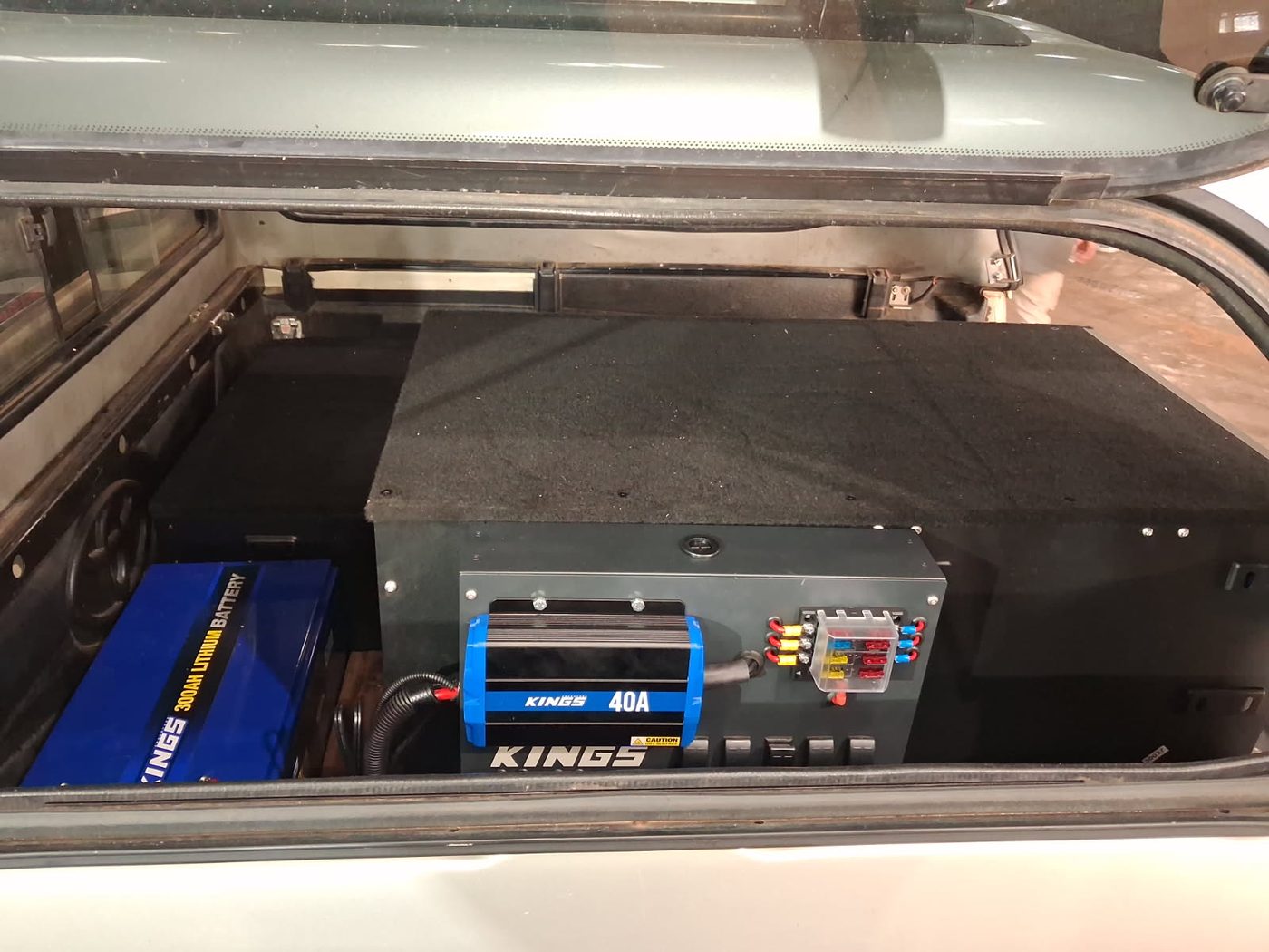 300Ah lithium battery and 40A DCDC charger with a fused distribution panel, fitted in a 4WD rear fitout